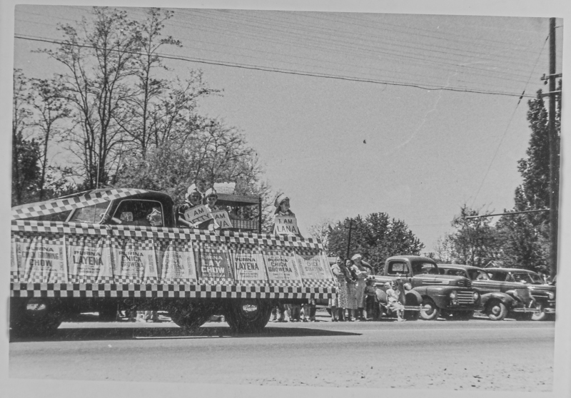 Betty, Ava/Eva, and Lana sit on top of the Purina Chow float.