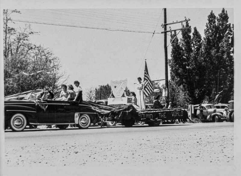 Float pulled by a possible Bel Air, along with a shield and 48 star flag.