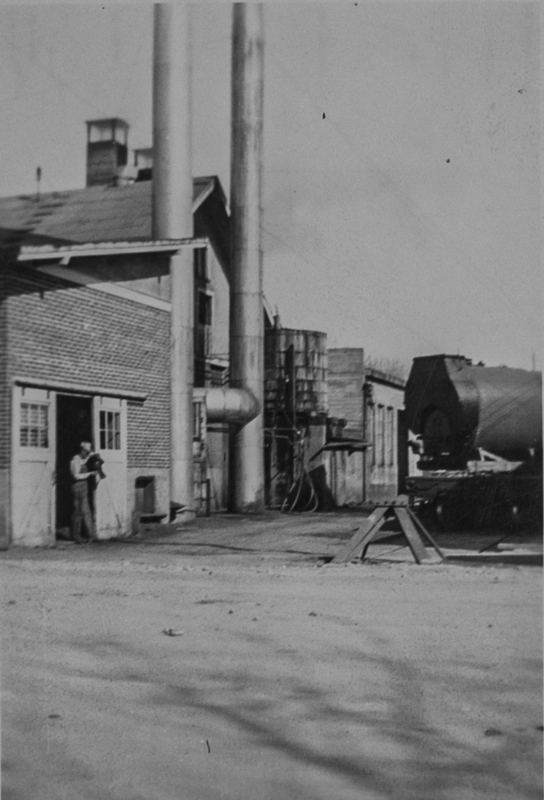 Man exiting the side of the Meridian Creamery