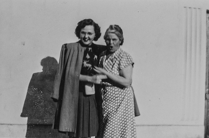 Two women get their photo taken