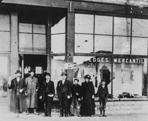 Shot of people outside Hedges mercantile, Idaho St.