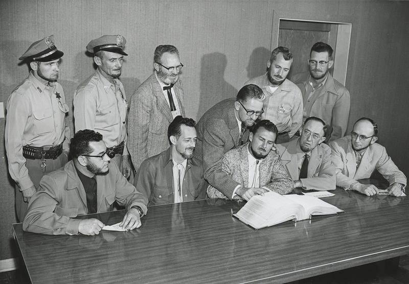 Police and city officials grow beards for Meridian Dairy Days; Back row left to right: Gene Hiner, Steve McGill, Herald Cox, Grant Ambrose, Roger Welker, Orville Vincent; Front row left to right: Terry McGoldrick, Dean Mayes, Don Storey, Bill Brown, Ray Pitman