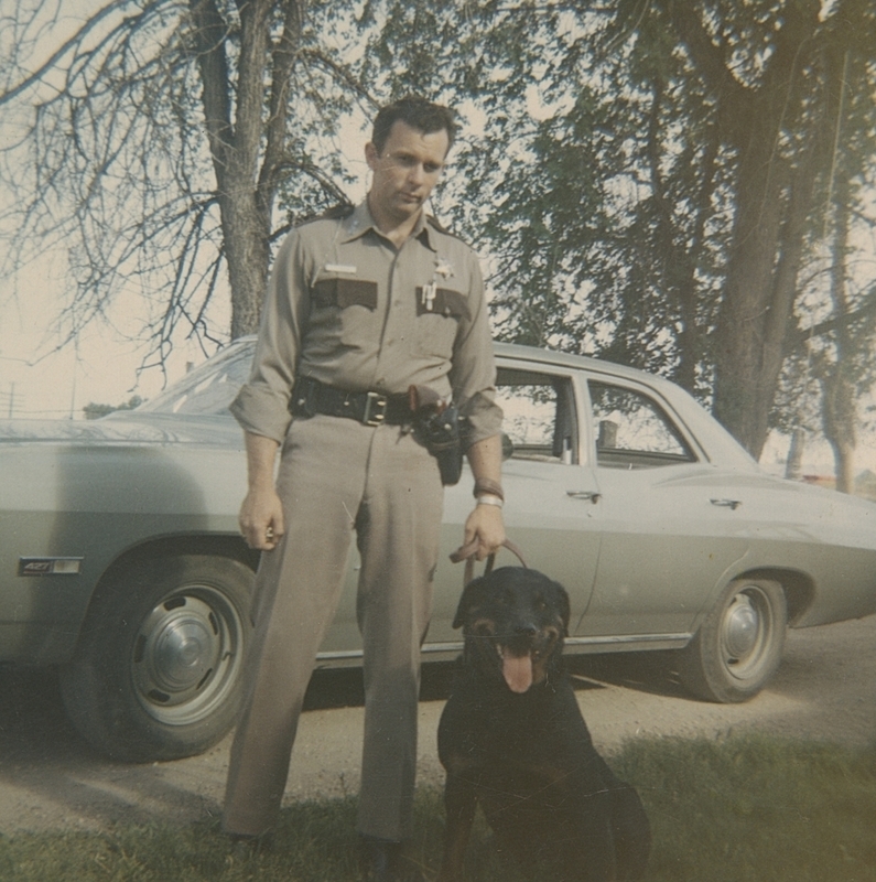 Meridian officer Dick Brumble with Sabrina, the new police dog.