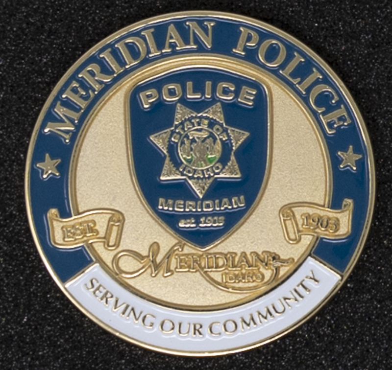 Meridian Police Coin 1-Front Side, circa 2007 or some time during Jeff Lavey's tenure as Meridian Police Chief. Front of coin focuses on Meridian Police "Serving Our Community."