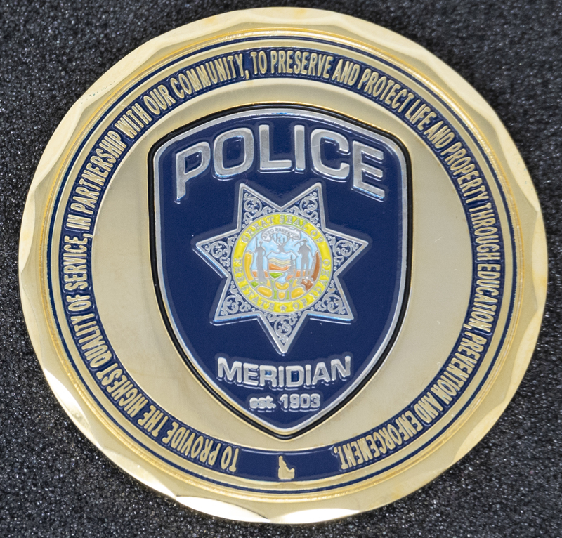 Meridian Police Coin 2-Back Side, circa 2007 or some time during Jeff Lavey's tenure as Meridian Police Chief. Reads: "To provide the highest quality of service, in partnership with our community, to preserve and protect life and property through education, prevention, and enforcement."