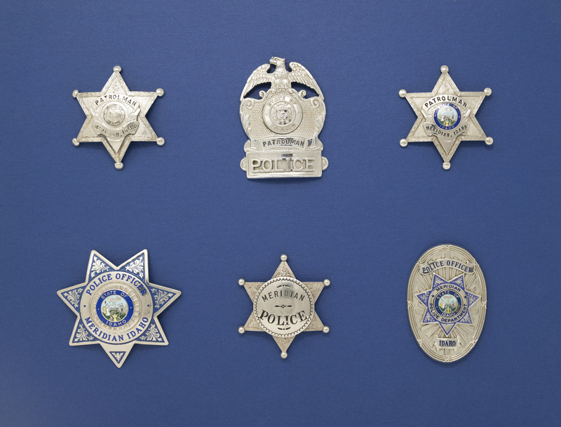 Collection of various framed Meridian Police Badges gifted to the department in January of 2009.