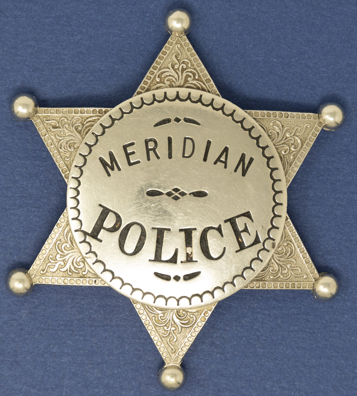 Meridian Police Badge (Star Shaped with round points)-this badge is undated, but star badges like this could be as old as the 1950s according to photos in this collection.