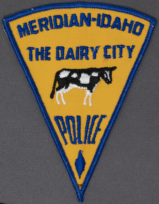 Meridian Police "The Dairy City" Patch (Second Patch) was released circa 1960s. This patch made in response to complaints the earlier patch version with the cow's tail upward was offensive. In this version the tail faces downward. The Meridian Police "Dairy City" patches were dropped in the late 1970s or early 1980s. This is considered the 3rd patch issued within the department, since the "Dairy City" patch contained to issued additions, and the first issued patch was in the 1950s. 