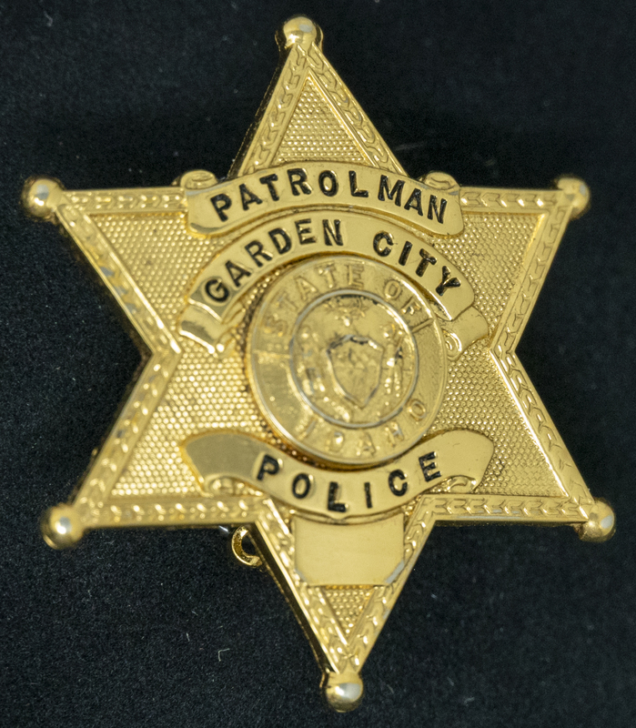 Gene Hiner Garden City Police Patrolman pin, part of the Gene Hiner Police Career Display presented to the MPD by Gene Hiner's family. Hiner served in the Garden City Police Department from 1954-1956. 