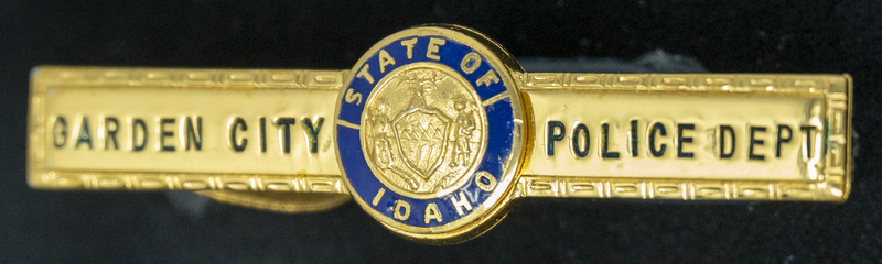 Gene Hiner Garden City Police tie clip, from Hiner's service in the Garden City Police Department 1954-1956. Part of the Gene Hiner Police Career Display presented to the MPD by Gene Hiner's family. 