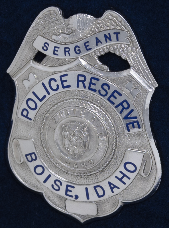 Boise Police Reserve Sergeant badge, part of MPD's Idaho patch and badge collection circa 2007. The patch and badge collection hangs on the MPD meeting room wall, and indicates the respect Meridian Police officers have for other police in the surrounding areas. 