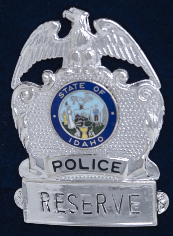 Boise Police Reserve badge, part of MPD's Idaho patch and badge collection circa 2007. The patch and badge collection hangs on the MPD meeting room wall, and indicates the respect Meridian Police officers have for other police in the surrounding areas. 