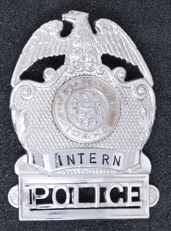 Boise Police Intern badge, part of MPD's Idaho patch and badge collection circa 2007. The patch and badge collection hangs on the MPD meeting room wall, and indicates the respect Meridian Police officers have for other police in the surrounding areas. 