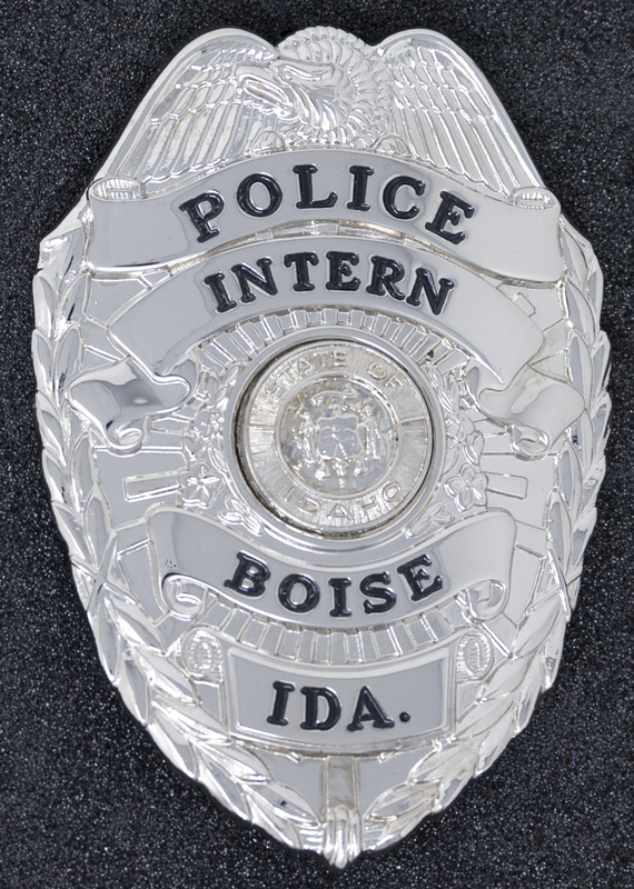 Boise Police Intern badge, part of MPD's Idaho patch and badge collection circa 2007. The patch and badge collection hangs on the MPD meeting room wall, and indicates the respect Meridian Police officers have for other police in the surrounding areas.