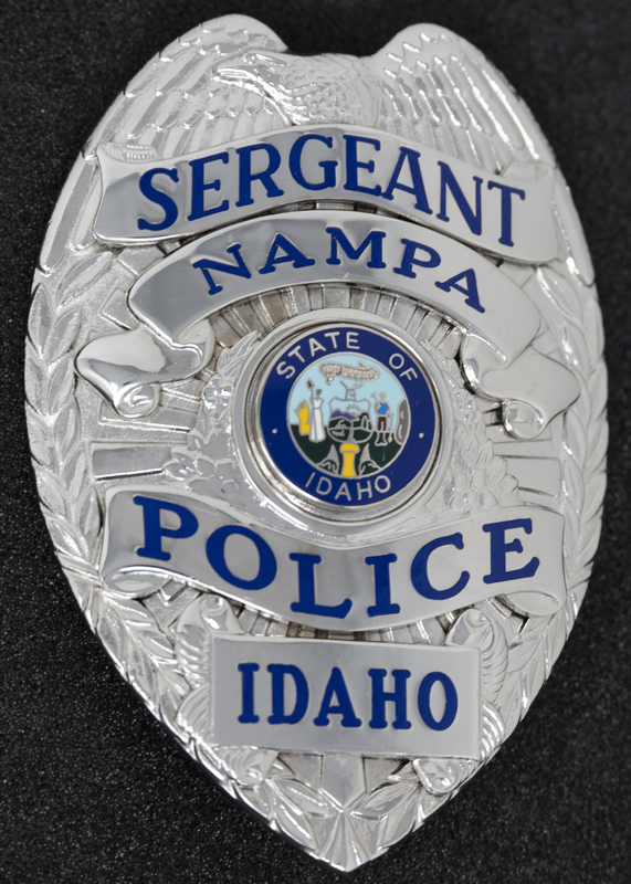 Nampa Police Sergeant badge, part of MPD's Idaho patch and badge collection circa 2011. The patch and badge collection hangs on the MPD meeting room wall, and indicates the respect Meridian Police officers have for other police in the surrounding areas.