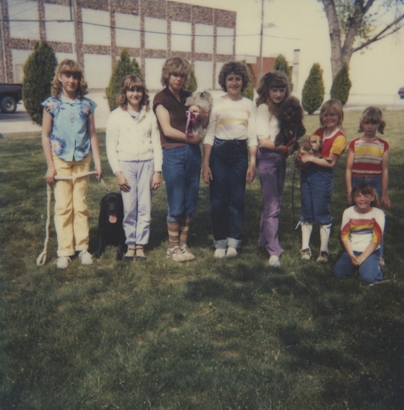 Meridian Library's First Annual Pet Parade, May 6, 1982. Featured in the photo are: Robin Rice, Amy Brown, Tammy Heinzel, Kendall Matuszek, Kerri Matuszek, Gina Marie Brown, Vernell Smith, Holli Boyd, and the pets (the stars of the show), Cocoa, Chrissy, Mr. Three, and Regis. 