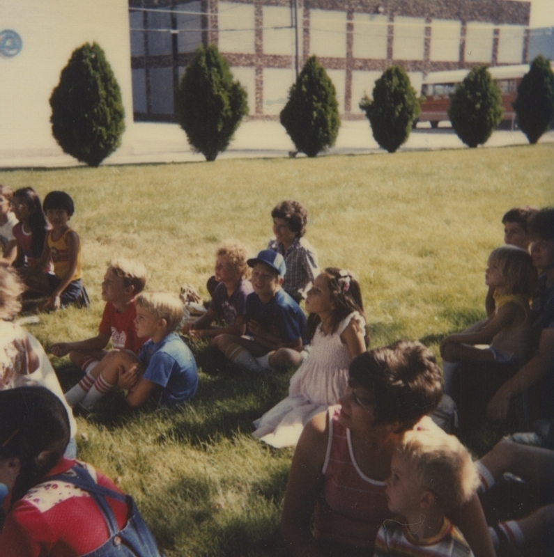 Patrons gather around for a Summer Reading Program event in 1982.