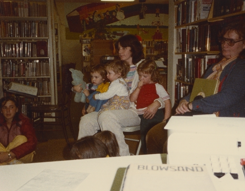 Children listen to storytime on Good Bear Day while holding onto their teddy bears, October 27, 1982. 