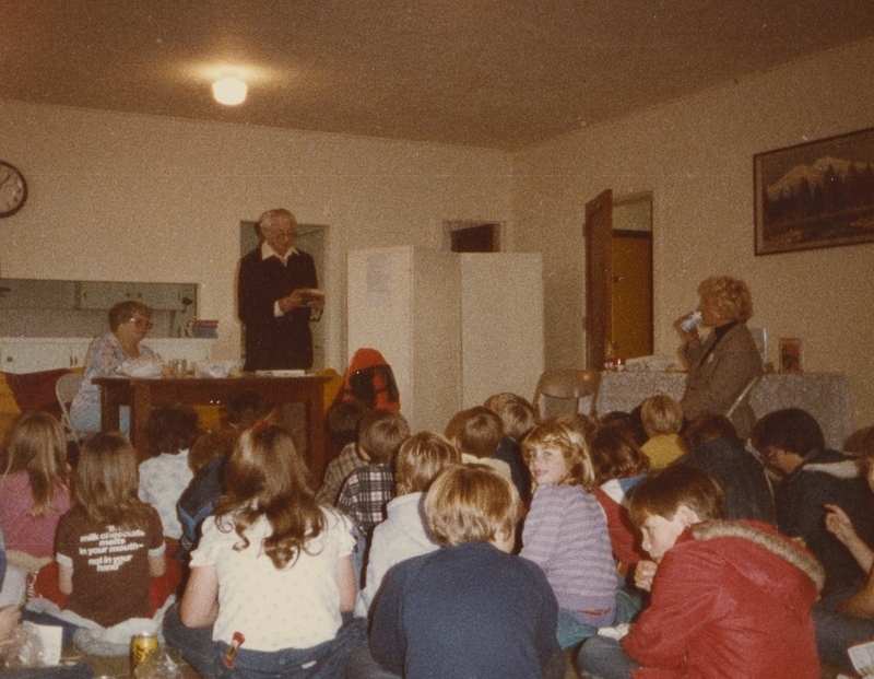 Carl and Madeline Rathjen lead a Brown Bag program with numerous children in attendance, circa November 1982.