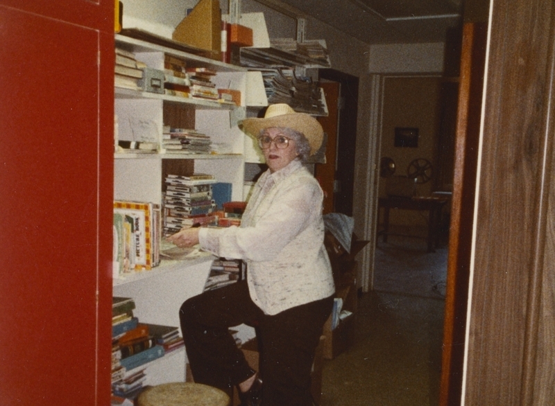 Librarian Evelyn Works During the Library's Western Theme