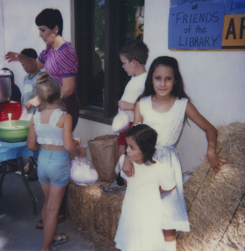 Children gather for Cotton Candy at the last event of the 1983 summer reading program. 