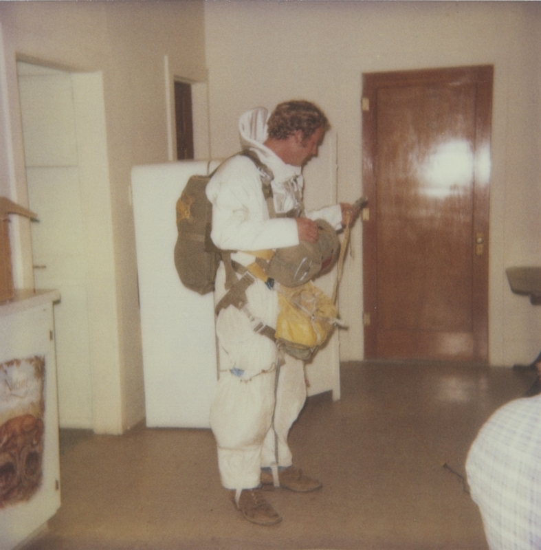 Randy Evans, guest smokejumper, appears for children after school on Tuesday, October 4, 1983. 