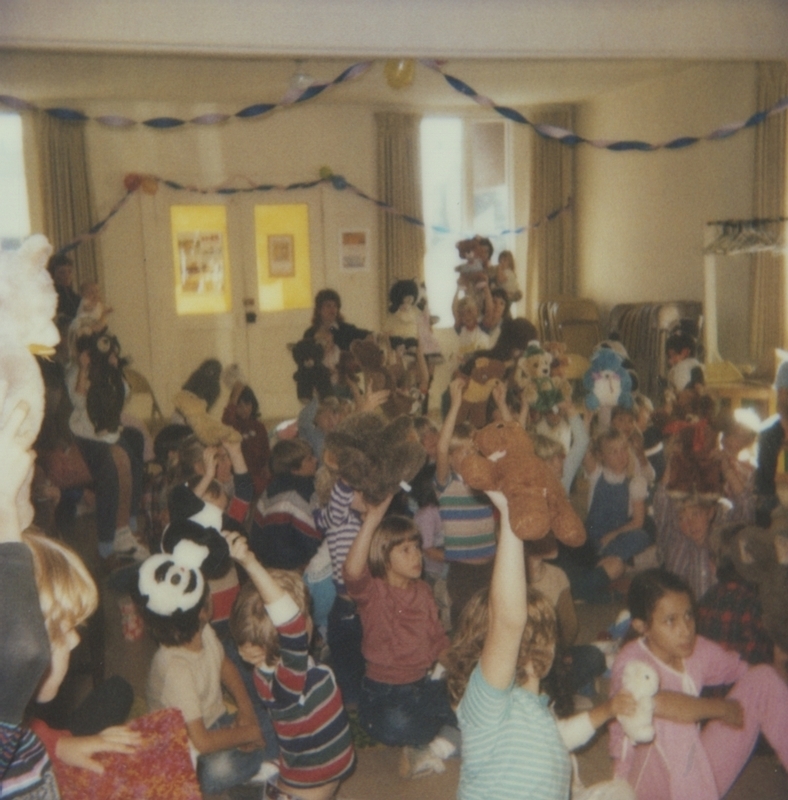 Children gather, with their teddy bears, for the Library's Good Bear Day.