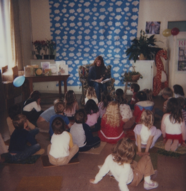 Kindergarten classes listen closely to "Little Brown Bear is Afriad of the Dark." 