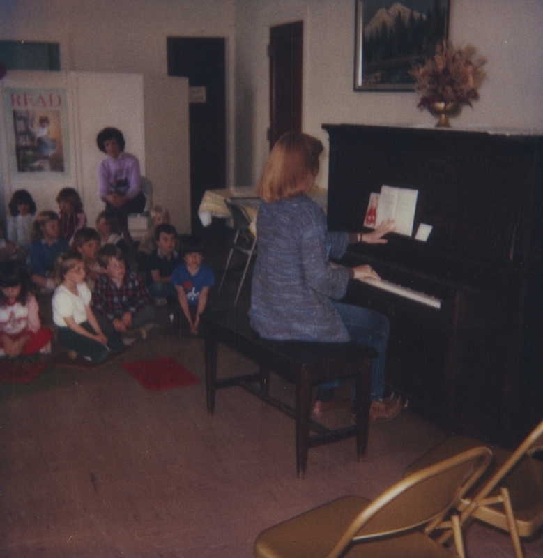 Kindergarten classes learn a "Good Morning" song. 