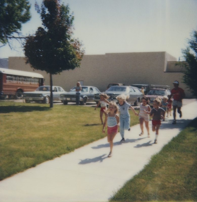 Bob Bodine teaches the children about sprinting, jogging, and running. 