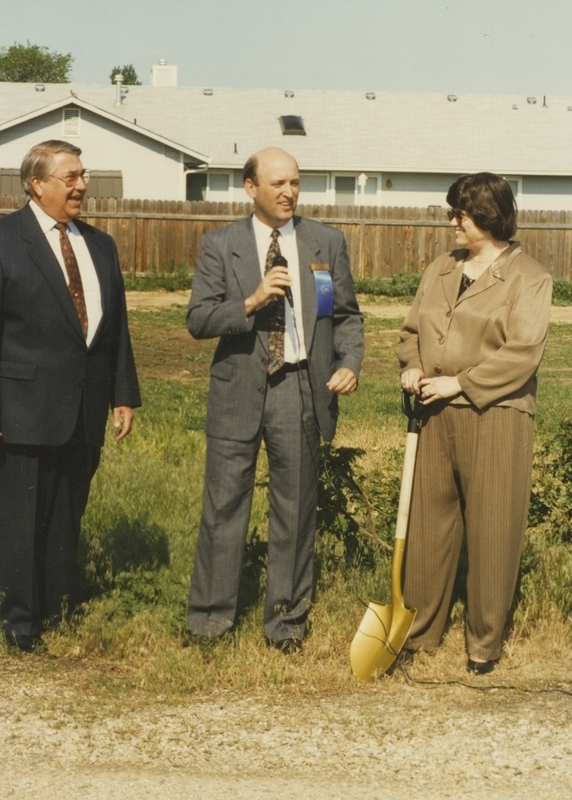 Meridian Chamber of Commerce President John Berg speaks at the Cherry Lane library ground breaking ceremony. On Berg's right is Mayor Bob Corrie, and on his left is Meridian Library Director Patty Younger.