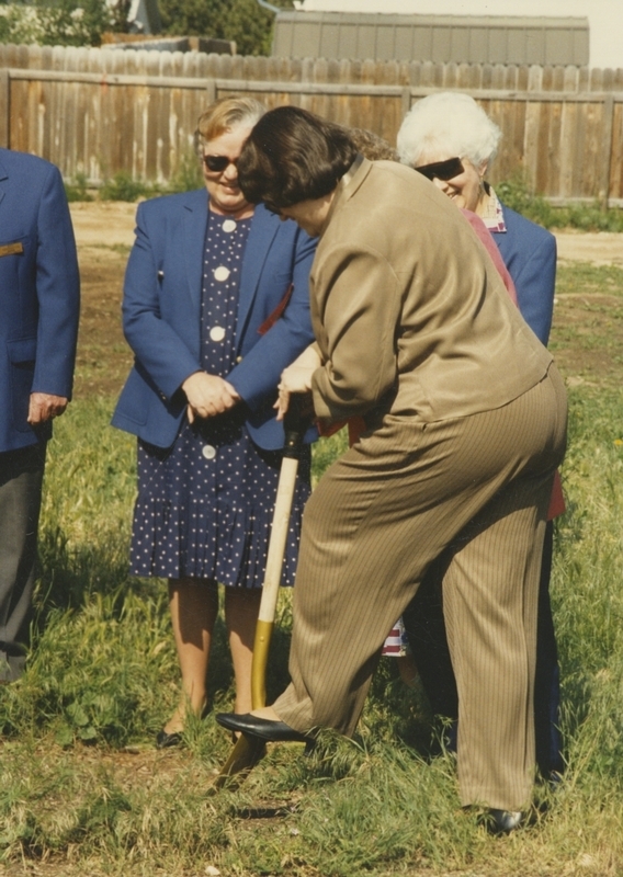 Meridian Library Director Patty Younger uses golden shovel to officially break ground for the construction of the new Cherry Lane Library Branch. 