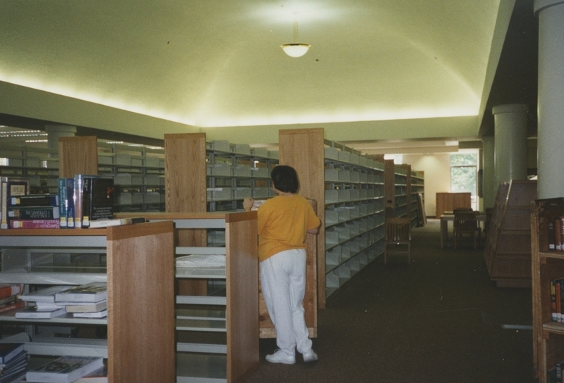 Empty shelves are starting to be loaded at the new Cherry Lane Library Building. 