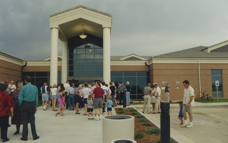 A crowd begins to gather for the Cherry Lane Library open house ceremony. 