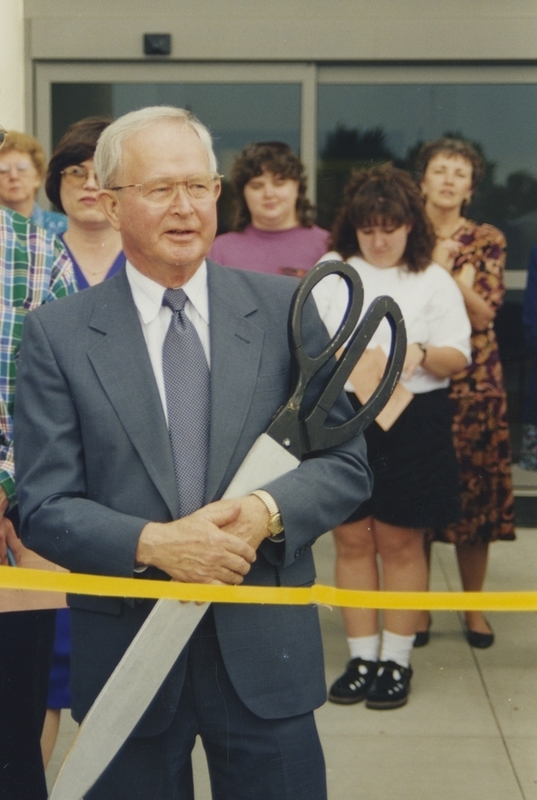 Idaho Governor Phil Batt prepares to do the honor of cutting the ribbon at the Meridian Cherry Lane Library Opening Ceremony