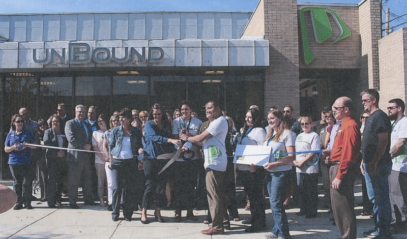 unBound Branch dedication and ribbon cutting event, October 2015. In the next three years, prior to the relocation of unBound, this building will have 35,000 visitors. The branch offered 3-D printing and technology classes, as well as helped small business owners in the area. unBound moved into a different location in April of 2021. 