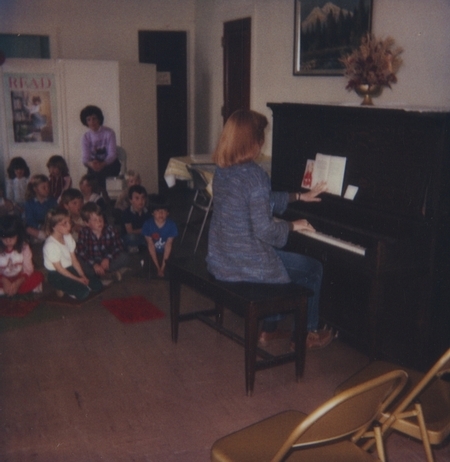 Kindergarten classes learn a "Good Morning" song. 