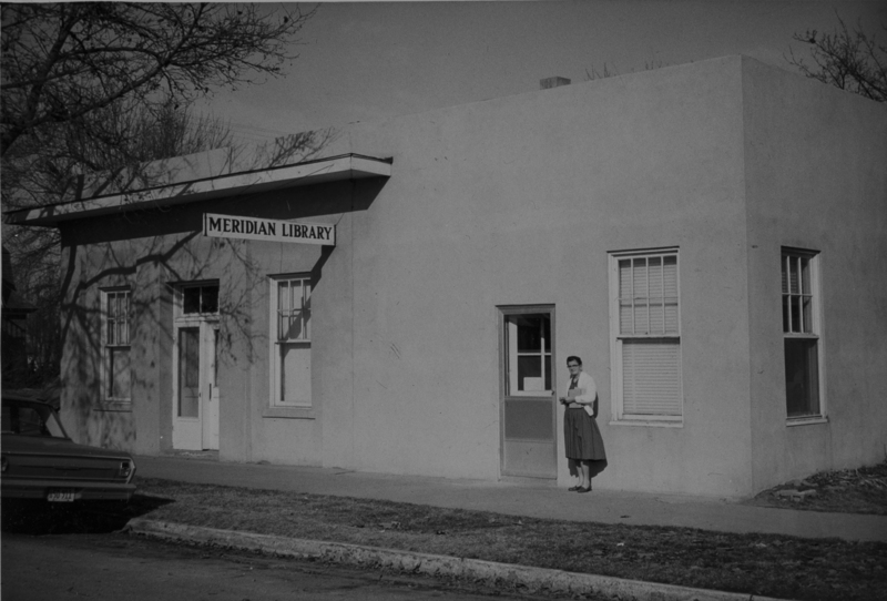 Picture of the Occident Clubhouse and the Meridian Library with librarian Nancy Sage (February 1964)