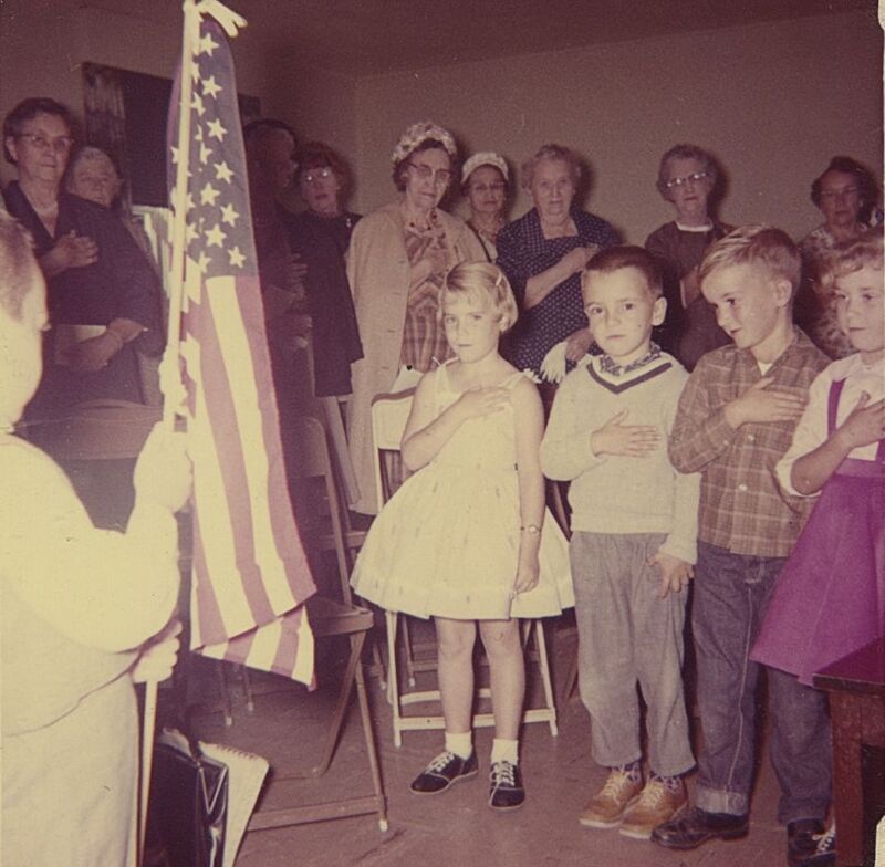 Mrs. Harold Shelton presented some of her Kindergarten students in the Pledge of Allegiance at the October 1982 club meeting; From left to right: Allan Pack (holding flag), Kathy Clauser, John Hunter, David Hammon, Barbara Birt 