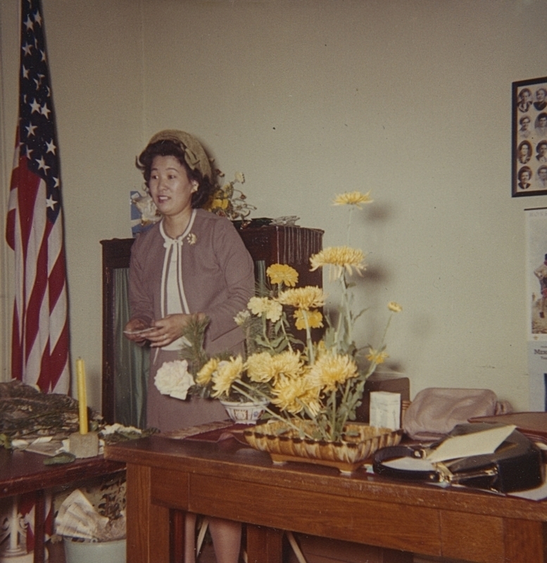 Mrs. Yoshie Cameron talks to the Occident Club abot flower arrangements and care