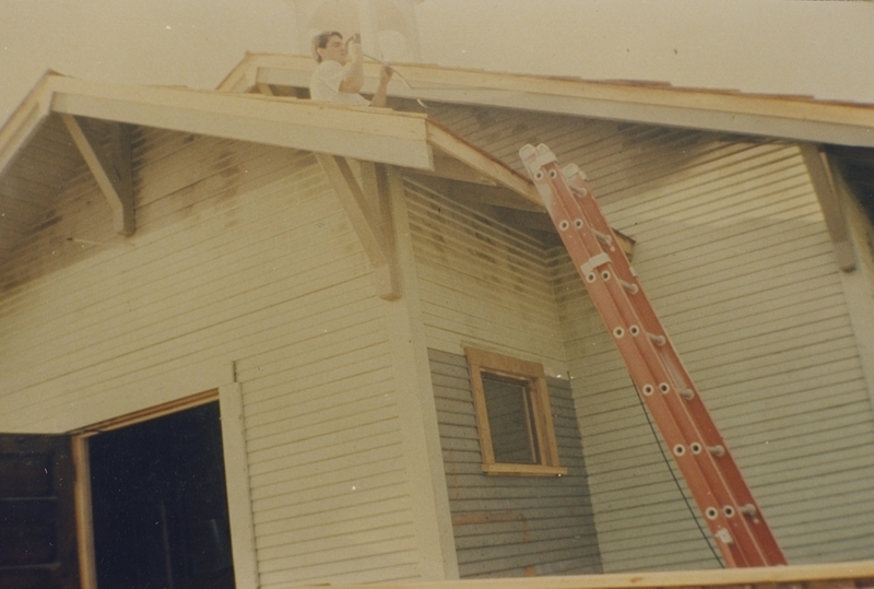 Installing power for the flagpole light for Pine Street School renovation, 1993