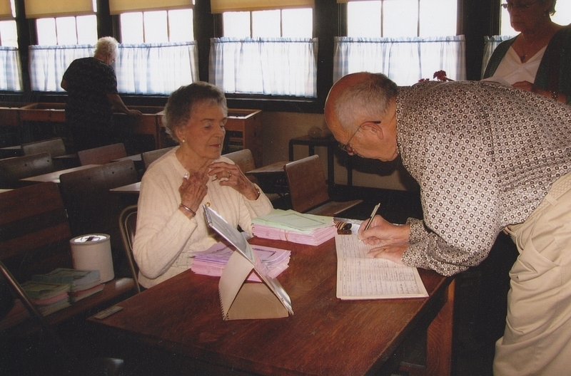 September 26, 2008–Helen Bryce works as a receptionist at the Pine Street School rededication Open House.