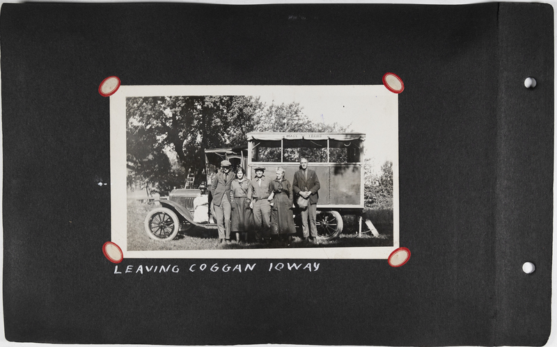 Willett family stands in front of auto bungalow in Coggan, Iowa.